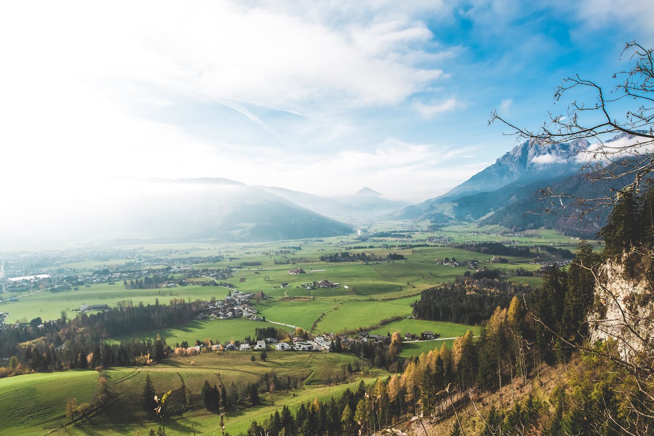 Stunning view of a lush valley with mountains, perfect for nature lovers.